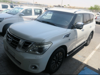 Nissan  Patrol  Platinum  2016  Automatic  248,000 Km  8 Cylinder  Four Wheel Drive (4WD)  SUV  White