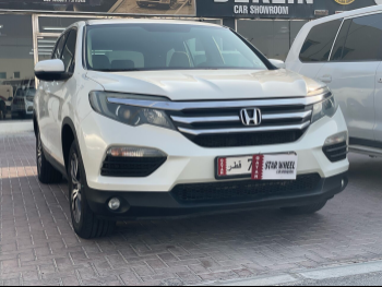 Honda  Pilot  2016  Automatic  166,000 Km  6 Cylinder  Four Wheel Drive (4WD)  SUV  White