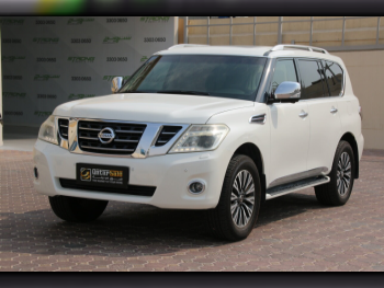 Nissan  Patrol  Platinum  2017  Automatic  131,000 Km  6 Cylinder  Four Wheel Drive (4WD)  SUV  White