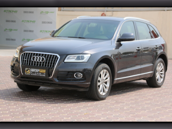 Audi  Q5  40 TFSI Quattro  2015  Automatic  70,650 Km  4 Cylinder  All Wheel Drive (AWD)  SUV  Gray