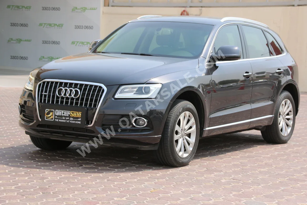 Audi  Q5  40 TFSI Quattro  2015  Automatic  70,650 Km  4 Cylinder  All Wheel Drive (AWD)  SUV  Gray