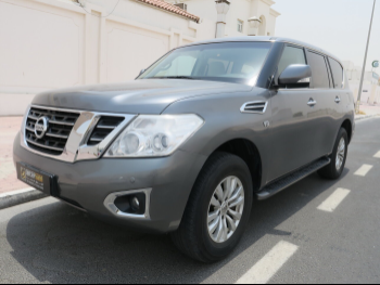 Nissan  Patrol  SE  2015  Automatic  75,000 Km  8 Cylinder  Four Wheel Drive (4WD)  SUV  Gray