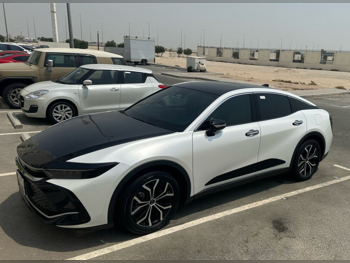 Toyota  Crown  Hybrid  2023  Automatic  31,000 Km  4 Cylinder  Front Wheel Drive (FWD)  Sedan  White and Black  With Warranty