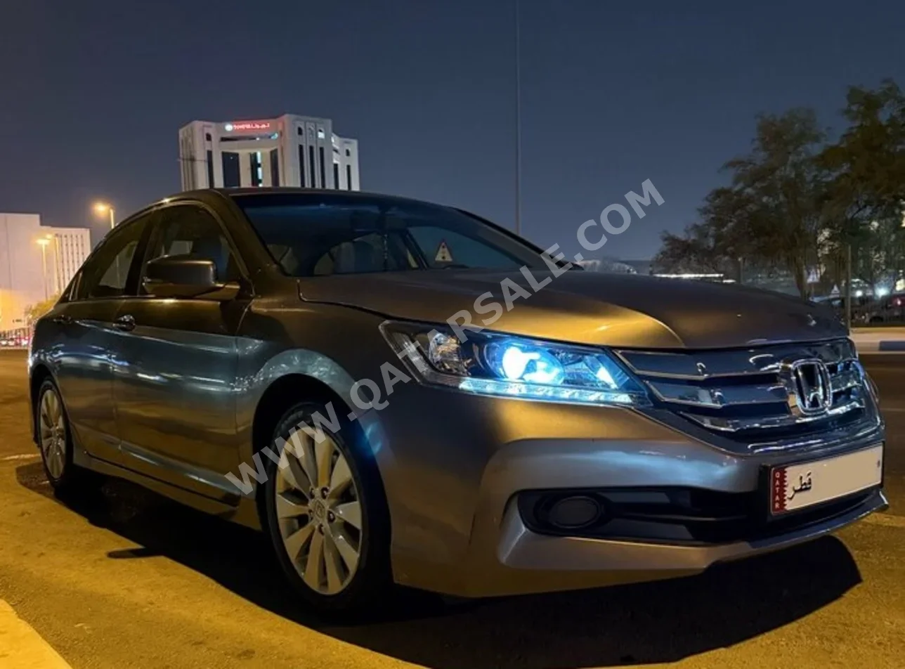 Honda  Accord  2016  Automatic  145,000 Km  4 Cylinder  Front Wheel Drive (FWD)  Sedan  Gray
