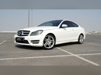 Mercedes-Benz  C-Class  250 AMG  2014  Automatic  170,000 Km  4 Cylinder  Rear Wheel Drive (RWD)  Coupe / Sport  White
