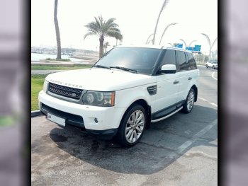 Land Rover  Range Rover  Sport  2011  Automatic  147,000 Km  8 Cylinder  Four Wheel Drive (4WD)  SUV  White
