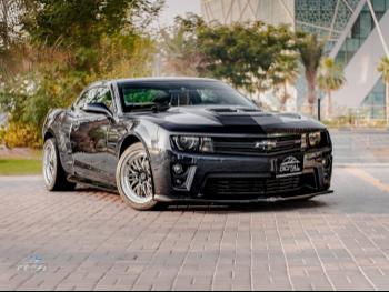 Chevrolet  Camaro  2013  Automatic  87,000 Km  4 Cylinder  Rear Wheel Drive (RWD)  Coupe / Sport  Gray