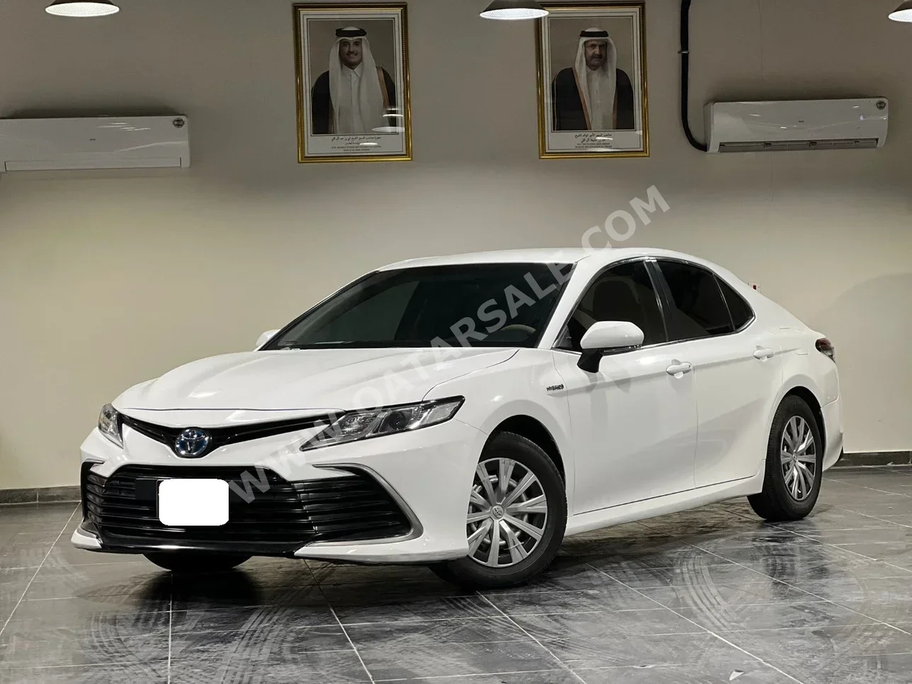Toyota  Camry  LE  2021  Automatic  267,000 Km  4 Cylinder  Front Wheel Drive (FWD)  Sedan  White