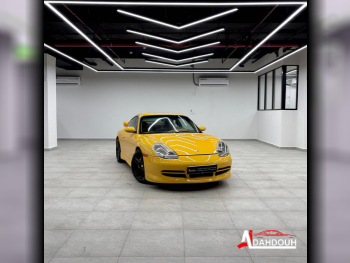 بورش  911  كاريرا  2001  اوتوماتيك  181,000 كم  6 سلندر  دفع خلفي  كوبيه \ سبورت  أصفر