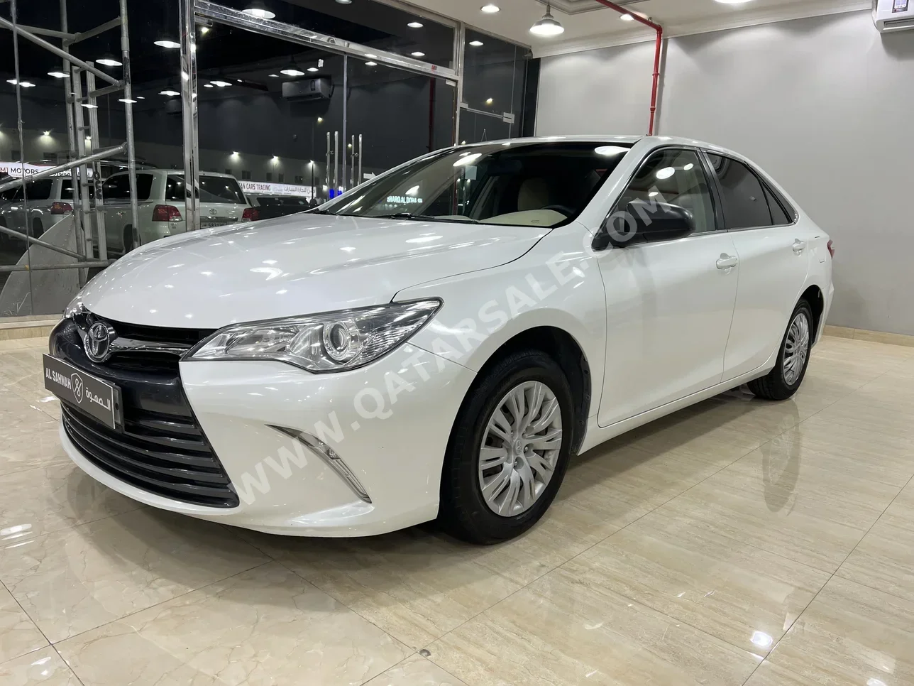 Toyota  Camry  LE  2017  Automatic  77,000 Km  4 Cylinder  Front Wheel Drive (FWD)  Sedan  White