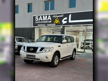 Nissan  Patrol  SE  2013  Automatic  269,000 Km  8 Cylinder  Four Wheel Drive (4WD)  SUV  White