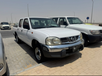 Nissan  Pickup  2013  Manual  200,000 Km  4 Cylinder  Rear Wheel Drive (RWD)  Pick Up  White