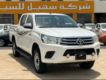 Toyota  Hilux  2019  Automatic  94,000 Km  4 Cylinder  Four Wheel Drive (4WD)  Pick Up  White