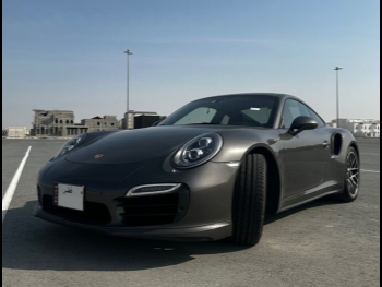 بورش  911  توربو اس  2014  اوتوماتيك  36,800 كم  6 سلندر  دفع رباعي  كوبيه \ سبورت  رمادي
