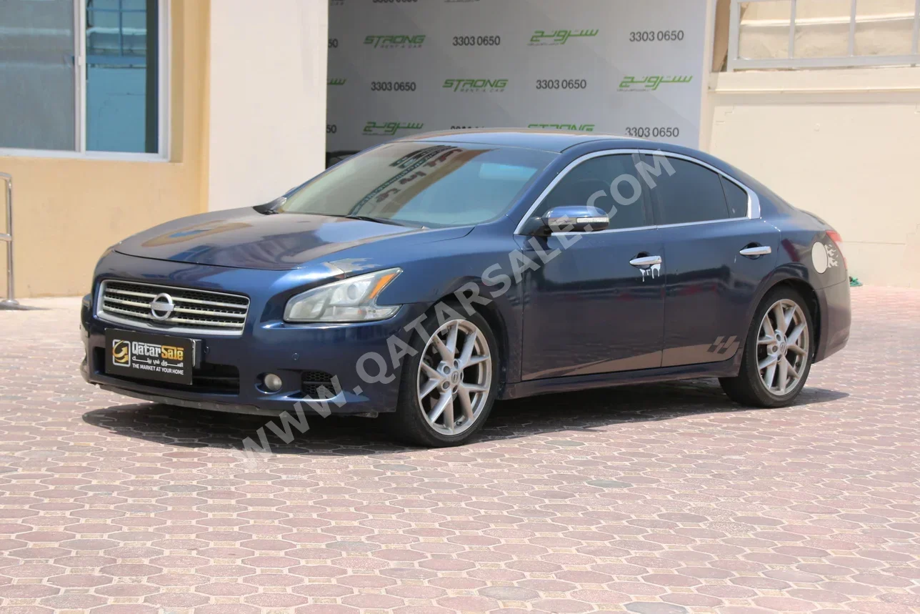 Nissan  Maxima  2010  Automatic  215,000 Km  6 Cylinder  Rear Wheel Drive (RWD)  Sedan  Blue