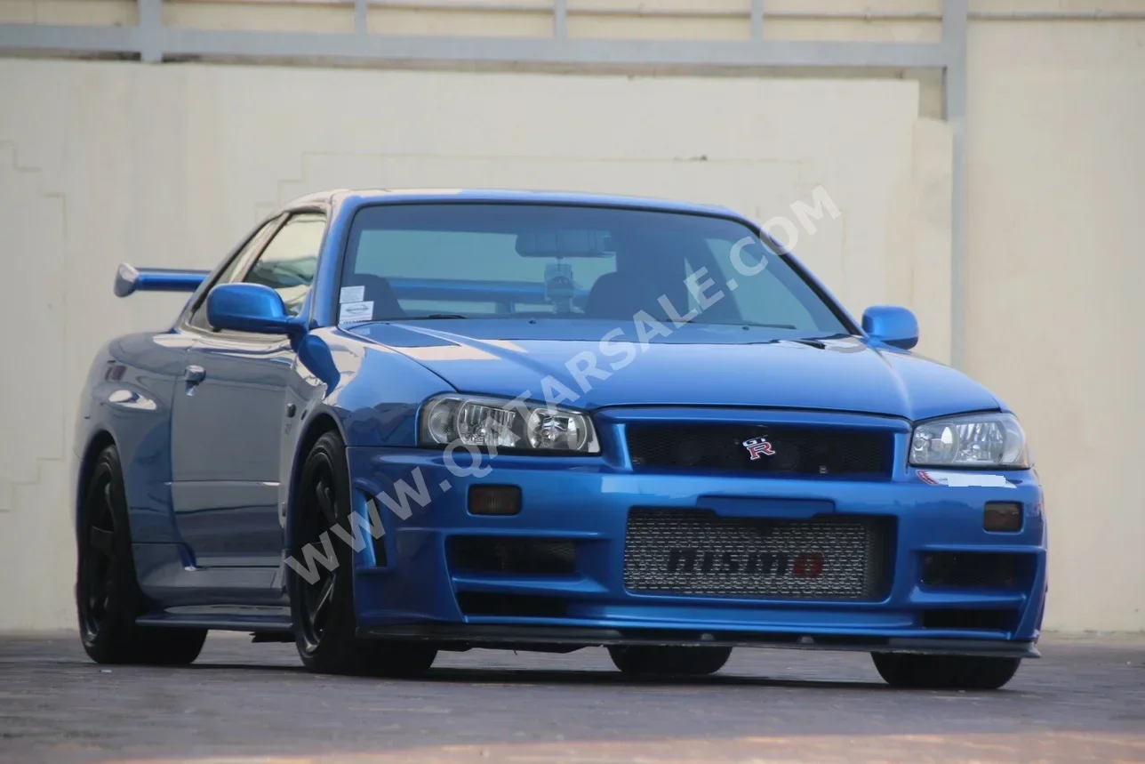 Nissan  GT-R  2001  Manual  150,000 Km  6 Cylinder  Rear Wheel Drive (RWD)  Coupe / Sport  Blue
