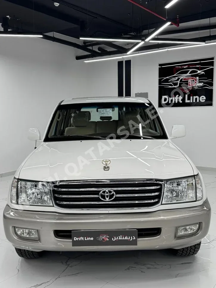 Toyota  Land Cruiser  GXR  2000  Automatic  499,000 Km  6 Cylinder  Four Wheel Drive (4WD)  SUV  White