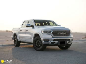 Dodge  Ram  Limited  2021  Automatic  32,500 Km  8 Cylinder  Four Wheel Drive (4WD)  Pick Up  White  With Warranty