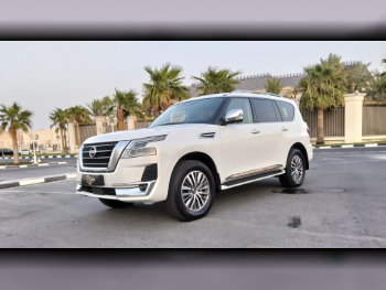 Nissan  Patrol  Platinum  2020  Automatic  136,000 Km  8 Cylinder  Four Wheel Drive (4WD)  SUV  White