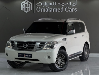 Nissan  Patrol  SE  2014  Automatic  235,000 Km  8 Cylinder  Four Wheel Drive (4WD)  SUV  White