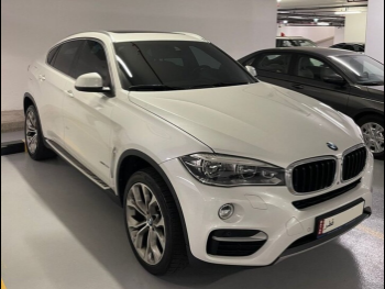 BMW  X-Series  X6  2018  Automatic  95,000 Km  6 Cylinder  Four Wheel Drive (4WD)  SUV  White