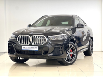 BMW  X-Series  X6 40i  2022  Automatic  63,000 Km  6 Cylinder  All Wheel Drive (AWD)  SUV  Black  With Warranty