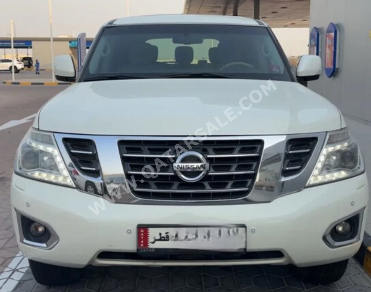نيسان  باترول  اس اي  2015  اوتوماتيك  270,000 كم  8 سلندر  دفع رباعي  اس يو في  أبيض