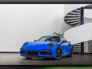 Porsche  911  Turbo S  2023  Automatic  12,200 Km  6 Cylinder  Rear Wheel Drive (RWD)  Coupe / Sport  Blue  With Warranty