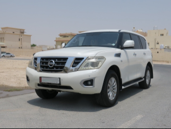 نيسان  باترول  اس اي  2015  اوتوماتيك  313,000 كم  8 سلندر  دفع رباعي  اس يو في  أبيض