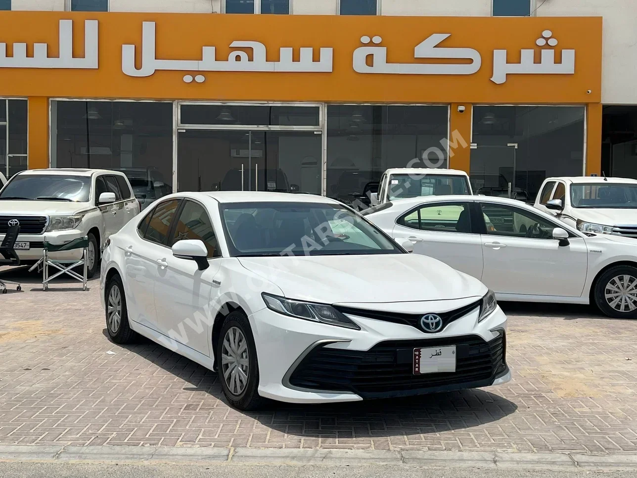 تويوتا  كامري  أل اي  2022  اوتوماتيك  257,000 كم  4 سلندر  سحب امامي  سيدان  أبيض