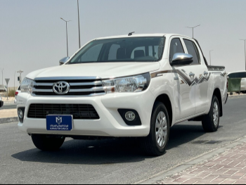 Toyota  Hilux  2024  Automatic  26,000 Km  4 Cylinder  Rear Wheel Drive (RWD)  Pick Up  White  With Warranty