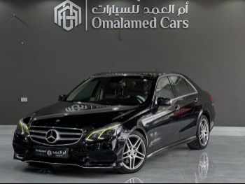 Mercedes-Benz  E-Class  300  2014  Automatic  105,000 Km  6 Cylinder  Rear Wheel Drive (RWD)  Sedan  Black