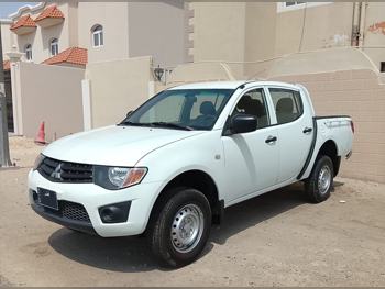 Mitsubishi  L 200  Diesel  2014  Manual  280,000 Km  4 Cylinder  Four Wheel Drive (4WD)  Pick Up  White
