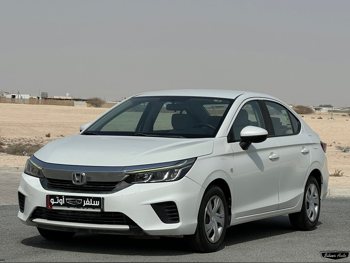 Honda  City  2021  Automatic  65,000 Km  4 Cylinder  Front Wheel Drive (FWD)  Sedan  White