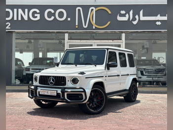 مرسيدس - بنز  جي - كلاس  63 اي ام جي  2021  اوتوماتيك  60,000 كم  8 سلندر  دفع رباعي  اس يو في  أبيض  تحت الضمان