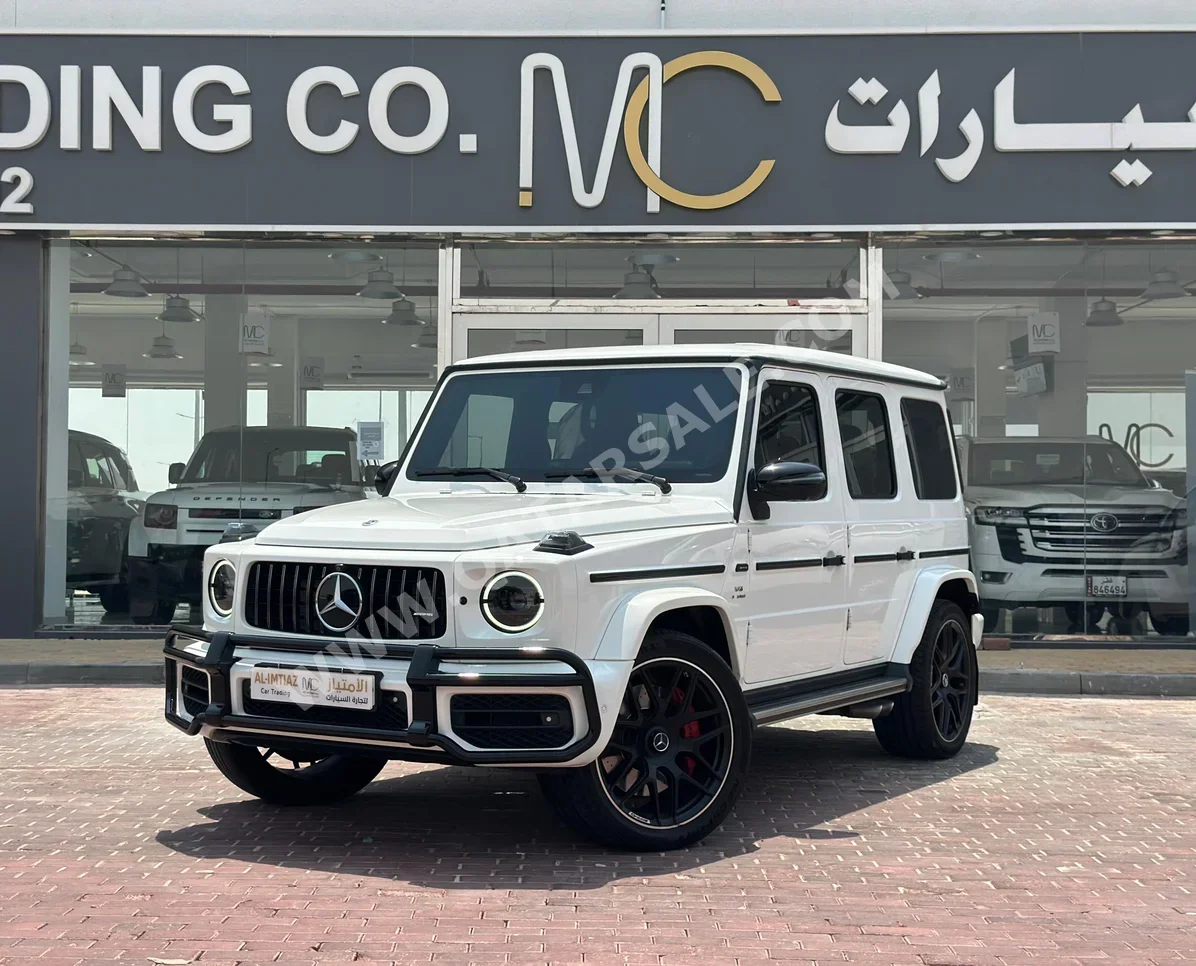 Mercedes-Benz  G-Class  63 AMG  2021  Automatic  60,000 Km  8 Cylinder  Four Wheel Drive (4WD)  SUV  White  With Warranty