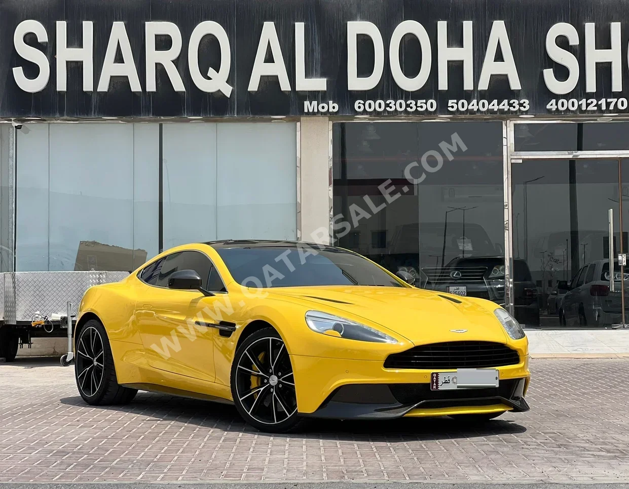Aston Martin  Vanquish  2018  Automatic  61,000 Km  8 Cylinder  All Wheel Drive (AWD)  Coupe / Sport  Yellow