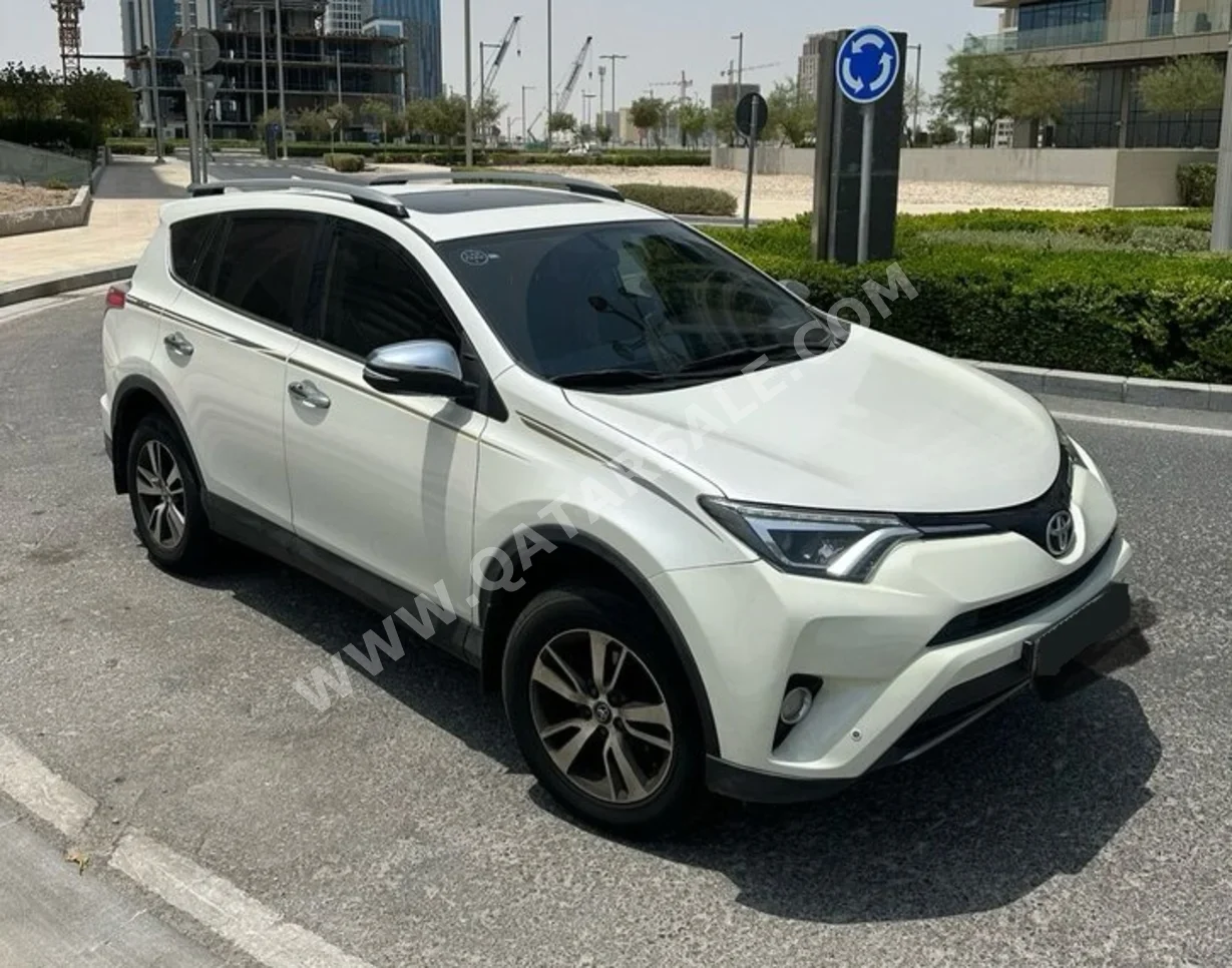 Toyota  Rav 4  2018  Automatic  93,000 Km  4 Cylinder  Four Wheel Drive (4WD)  SUV  White