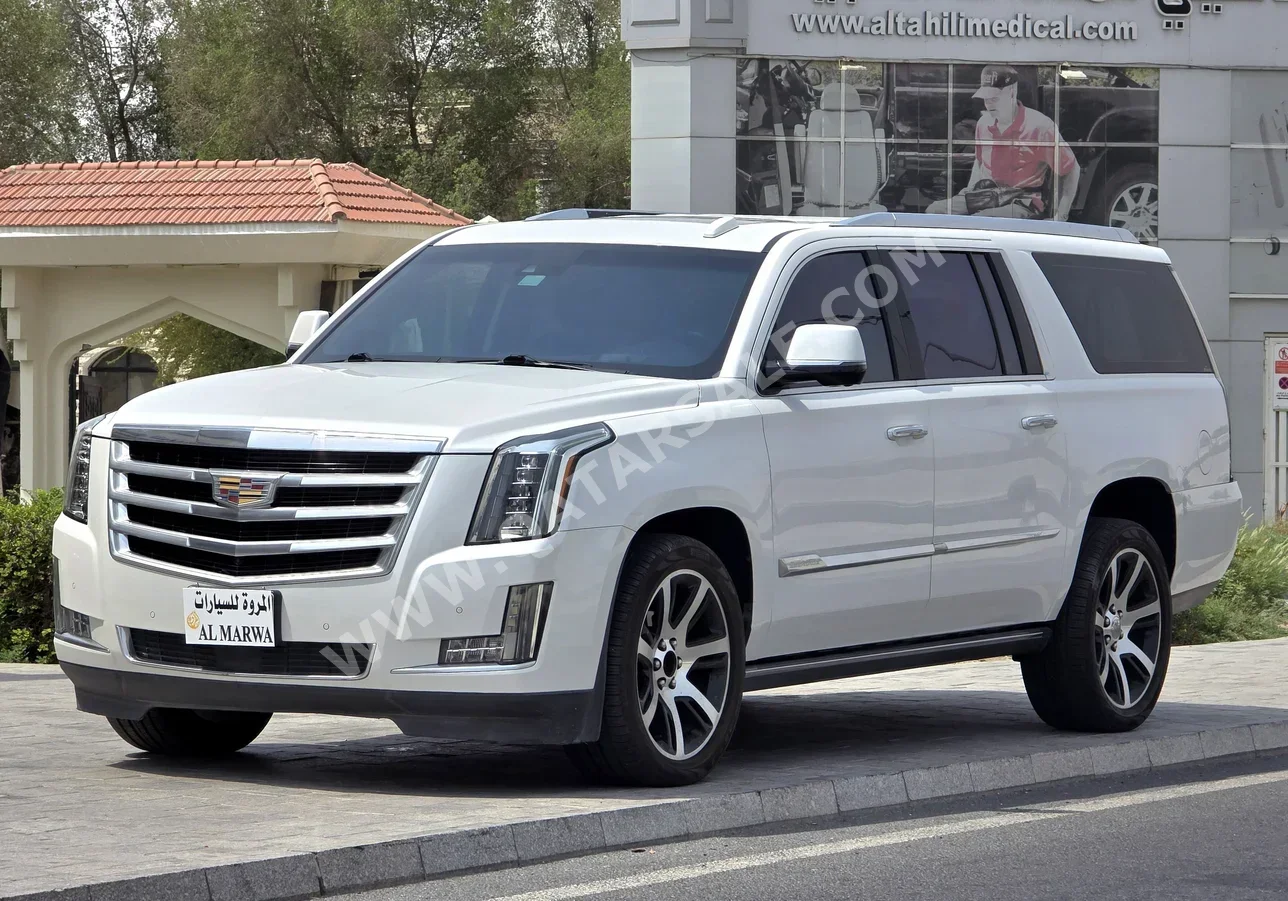 Cadillac  Escalade  2017  Automatic  127,000 Km  8 Cylinder  Four Wheel Drive (4WD)  SUV  White