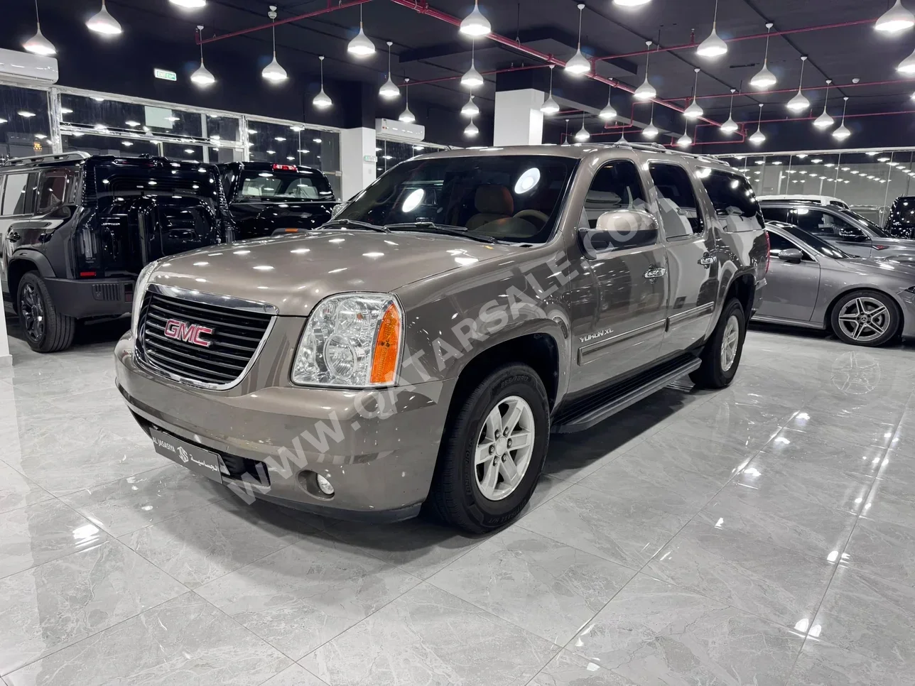 GMC  Yukon  XL  2013  Automatic  116,000 Km  8 Cylinder  Four Wheel Drive (4WD)  SUV  Light Brown
