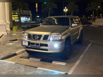Nissan  Patrol  Safari  2005  Automatic  311,000 Km  6 Cylinder  Four Wheel Drive (4WD)  SUV  Gold
