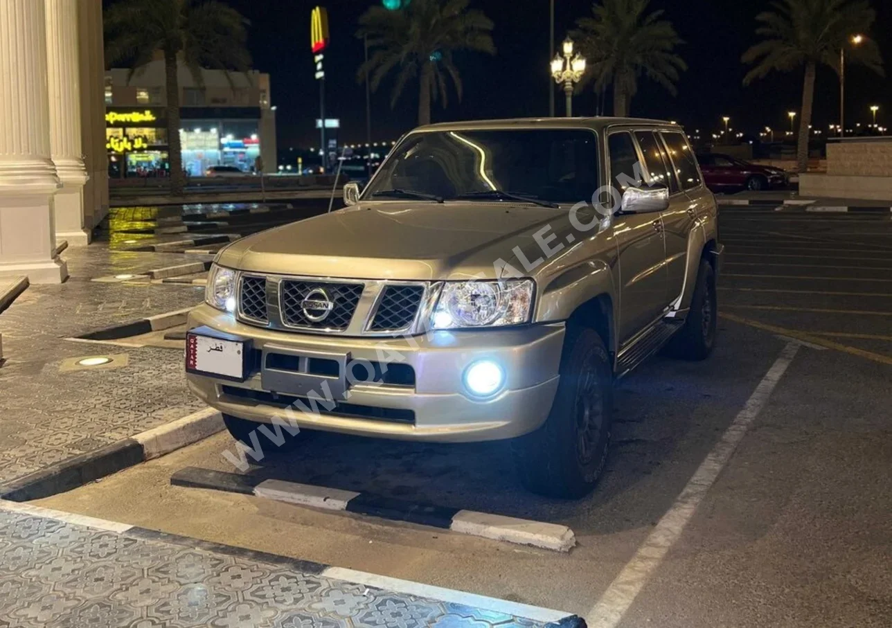 نيسان  باترول  سفاري  2005  اوتوماتيك  311,000 كم  6 سلندر  دفع رباعي  اس يو في  ذهبي