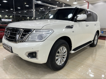 Nissan  Patrol  SE  2014  Automatic  260,000 Km  8 Cylinder  Four Wheel Drive (4WD)  SUV  White  With Warranty