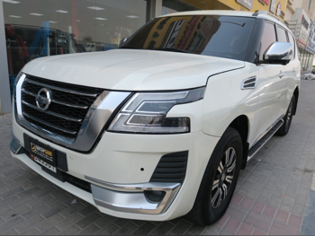 Nissan  Patrol  SE  2015  Automatic  291,000 Km  8 Cylinder  Four Wheel Drive (4WD)  SUV  White
