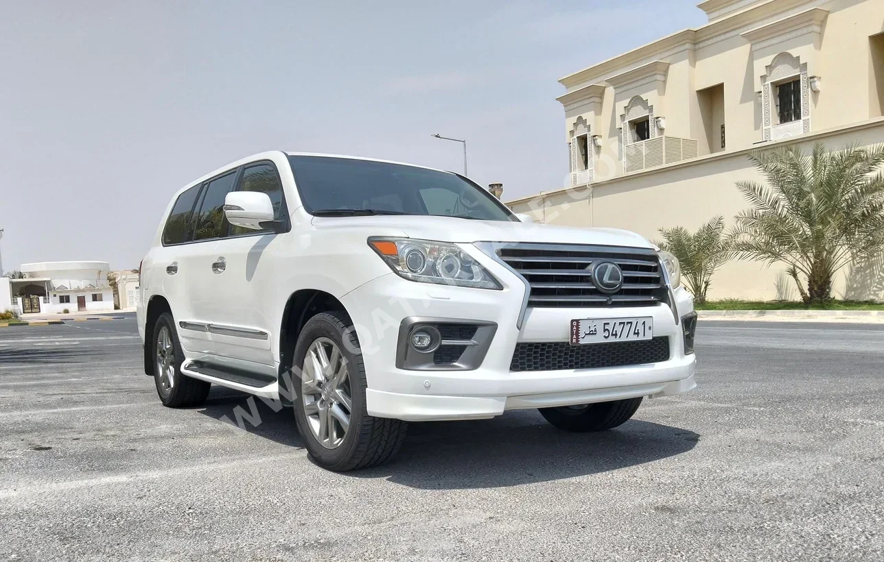 Lexus  LX  570  2015  Automatic  220,000 Km  8 Cylinder  Four Wheel Drive (4WD)  SUV  White