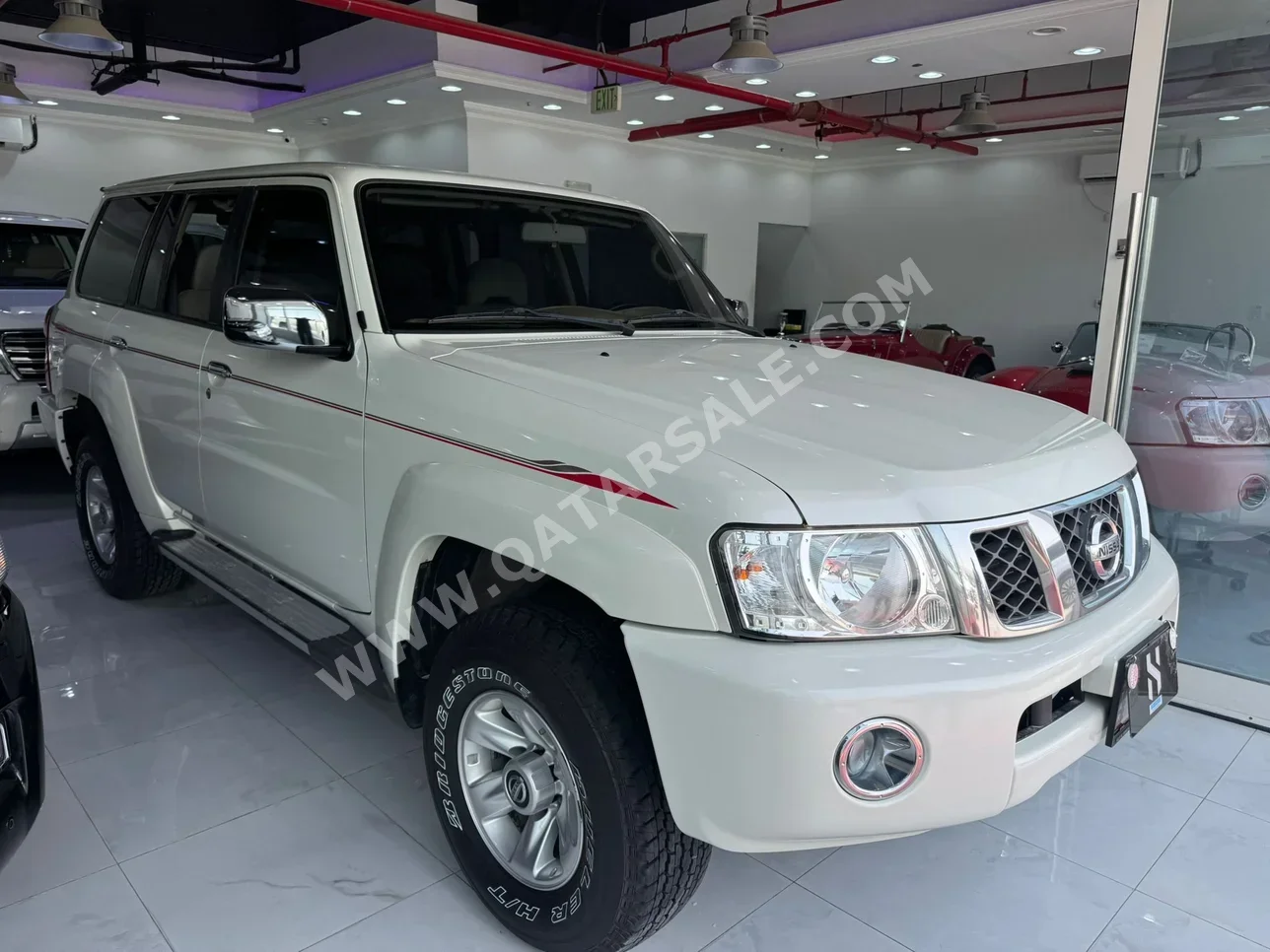 Nissan  Patrol  Safari  2021  Automatic  68,000 Km  6 Cylinder  Four Wheel Drive (4WD)  SUV  White