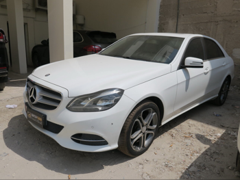 Mercedes-Benz  E-Class  200  2016  Automatic  79,000 Km  4 Cylinder  Rear Wheel Drive (RWD)  Sedan  White