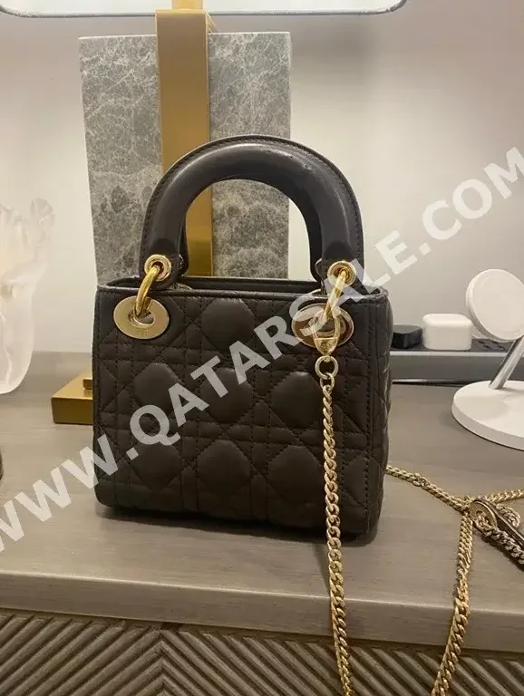 حقائب  ديور \  نسائي  قطر