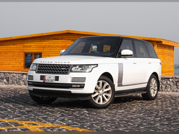 Land Rover  Range Rover  Vogue  2014  Automatic  89,000 Km  8 Cylinder  Four Wheel Drive (4WD)  SUV  White