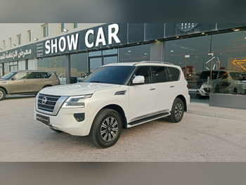 Nissan  Patrol  Titanium  2020  Automatic  99,000 Km  8 Cylinder  Four Wheel Drive (4WD)  SUV  White